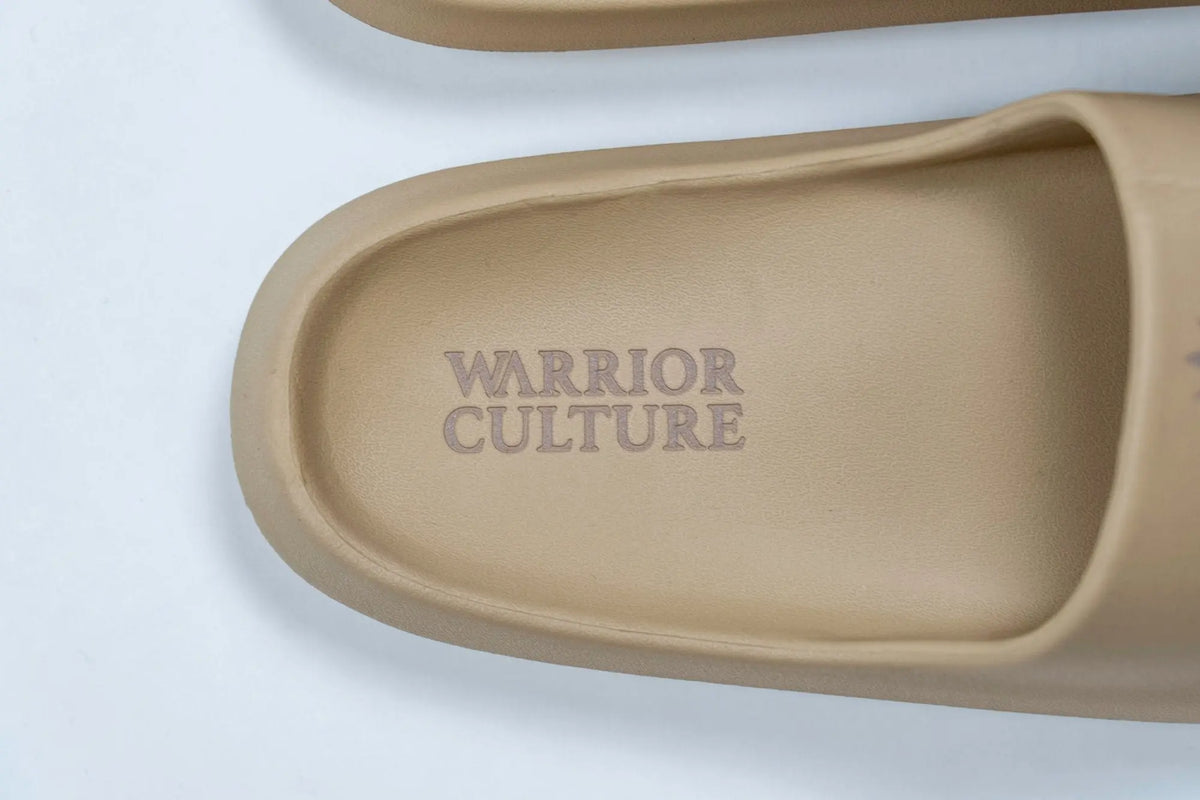 Frontier Recovery Sliders in Beige, Warrior Culture footbed detail