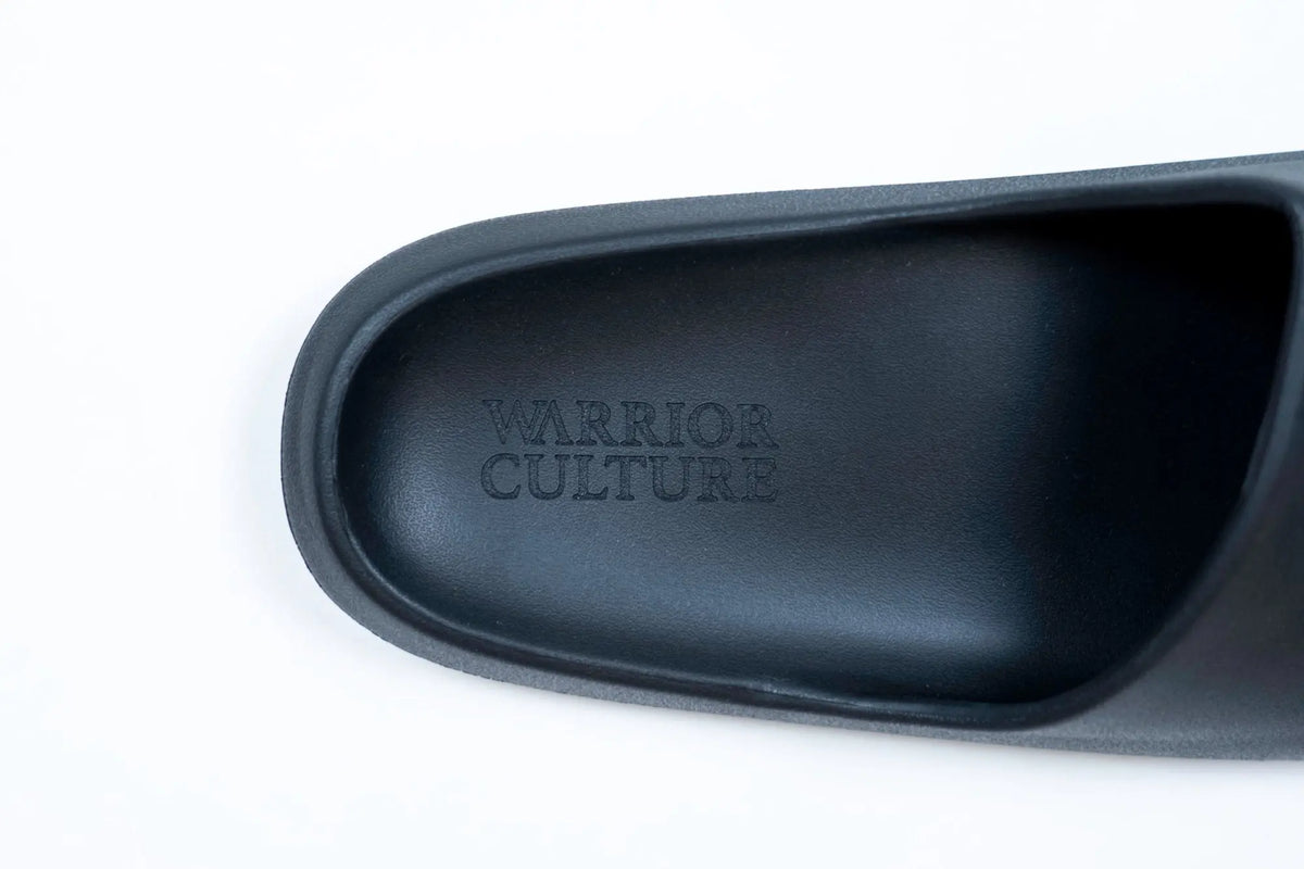 Frontier Recovery Sliders in Black, Warrior Culture footbed detail
